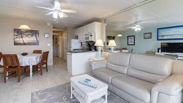 Condo, 1 Queen Bed with Sofa bed, Kitchen, Beach View | Living area | Flat-screen TV