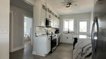 House, Multiple Beds, Kitchen | Private kitchen | Fridge, microwave, oven, stovetop