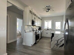 House, Multiple Beds, Kitchen | Private kitchen