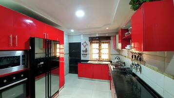 Apartment | Private kitchen | Fridge, microwave, oven, stovetop