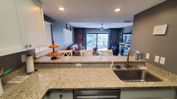 Condo, Multiple Beds, Kitchen, Pool View | Interior