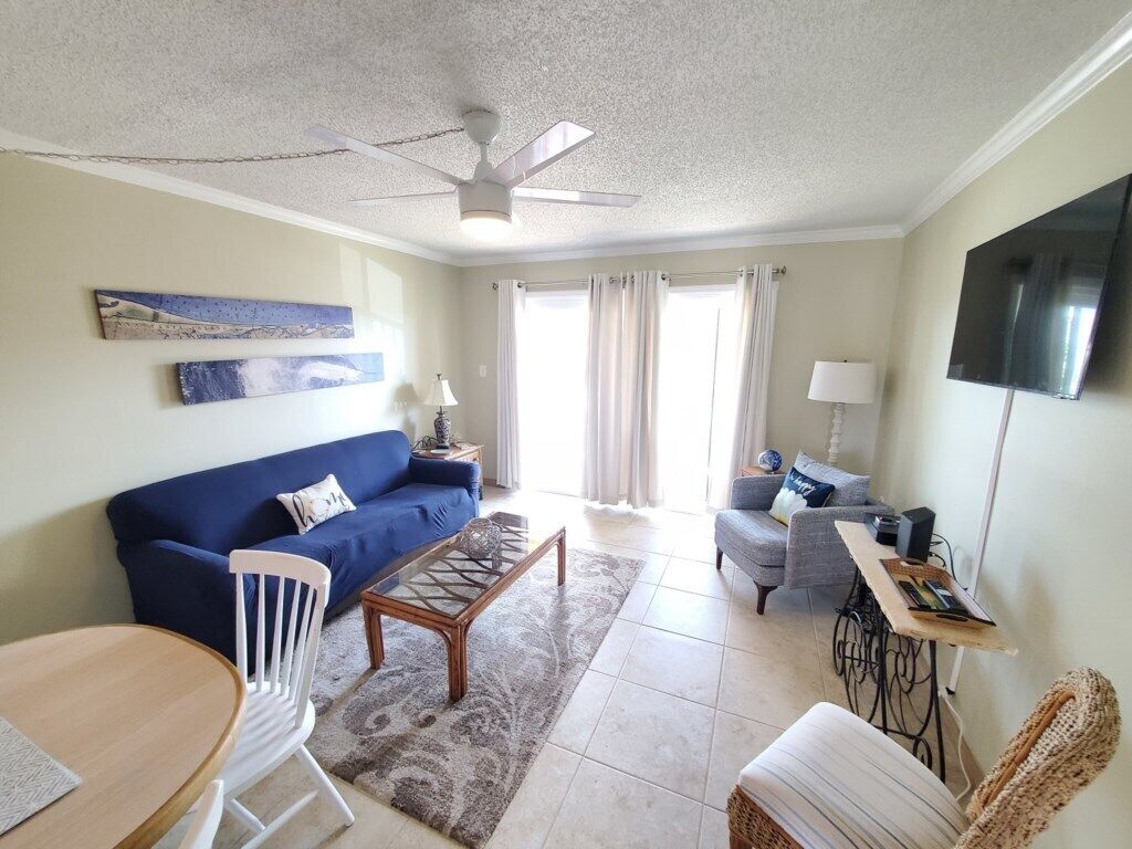 Condo, Multiple Beds, Pool Access | Living area | 40-inch flat-screen TV with cable channels, TV
