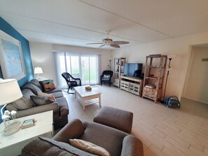 Condo, Multiple Beds, Kitchen, Pool View | Living area | 40-inch flat-screen TV with cable channels, TV - Summerhouse 104 (St. Augustine)