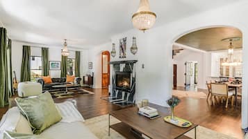 Smart TV, fireplace, books, music library
