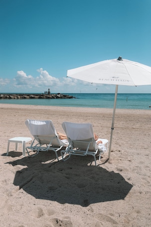 Beach towels. Deluxe One Bedroom apartment with two full baths*, open kitchen, living room, terrace and beach service at Bal Harbour