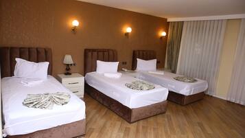 ستائر تعتيم وتجهيزات عازلة للصوت وواي فاي مجانًا وملاءات أسرّة