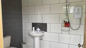 Cabin, 1 Queen Bed | Bathroom | Shower, towels
