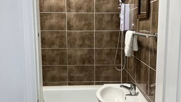 Apartment | Bathroom | Combined shower/bathtub, deep-soaking bathtub, hair dryer, towels