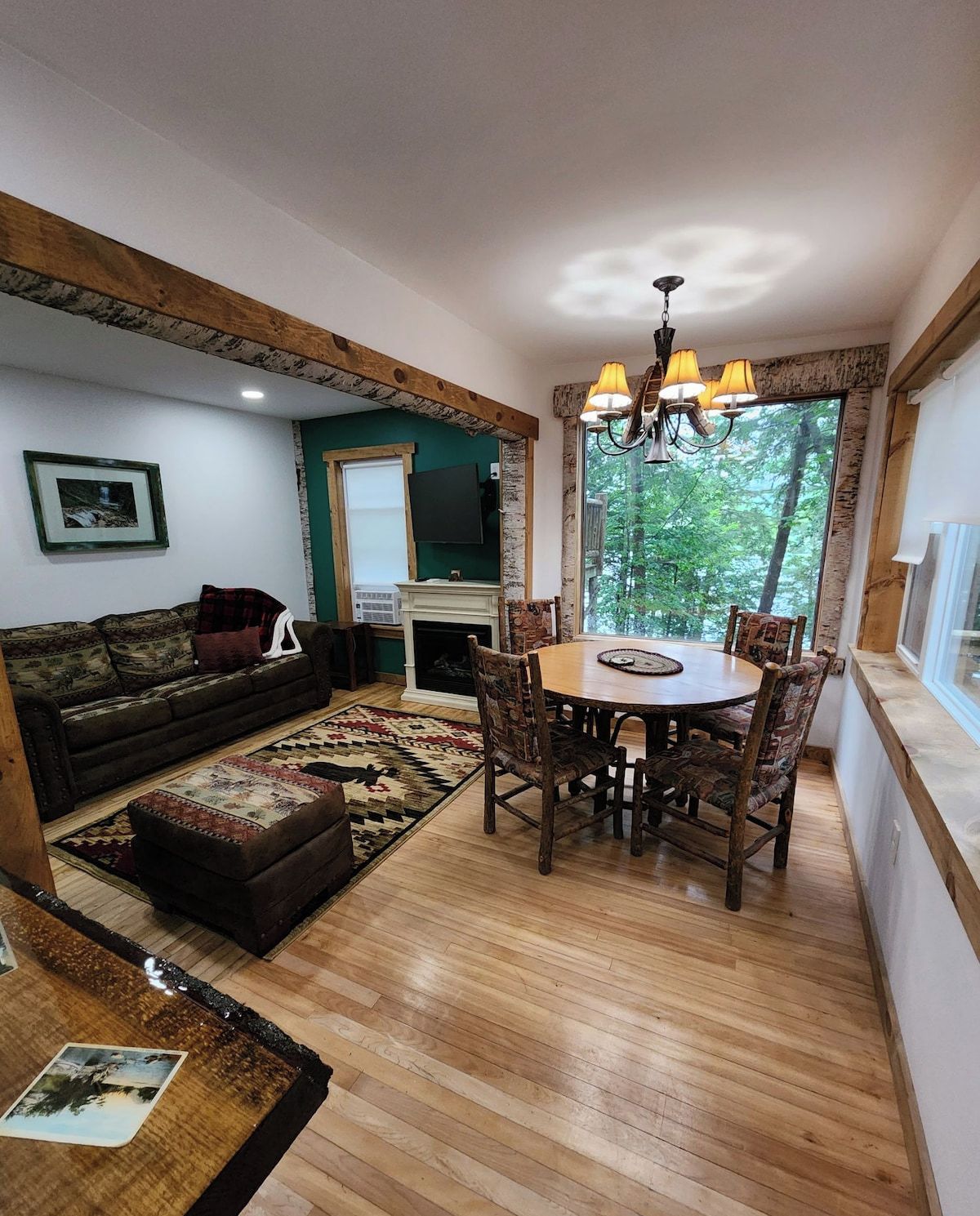 The Living room, dining area and grand picture window.