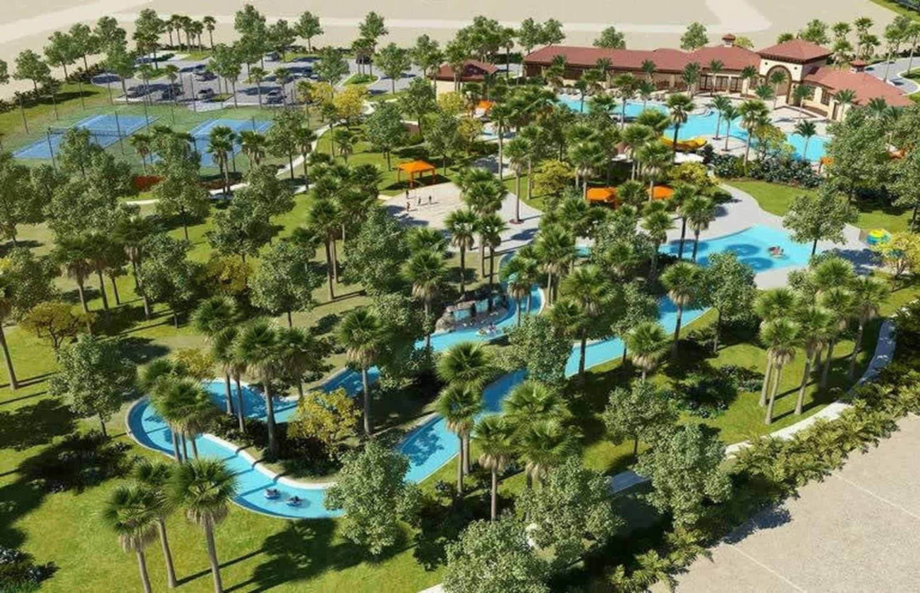 A resort with multiple swimming pools, palm trees, and resort buildings.