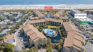 A resort with a heated lagoon pool, beach access, and a bar and restaurant. - Fully remodeled winter home away from home - Steps away from beach and pools (St. Augustine Beach)
