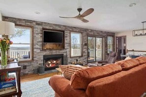 Smart TV, fireplace, table football, books