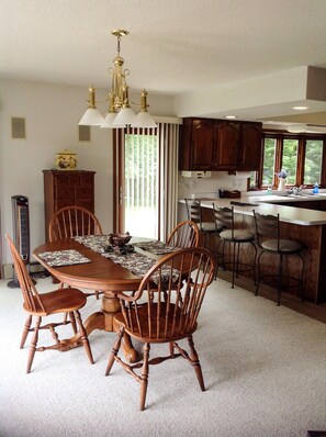 Dining room seats 9 comfortably.