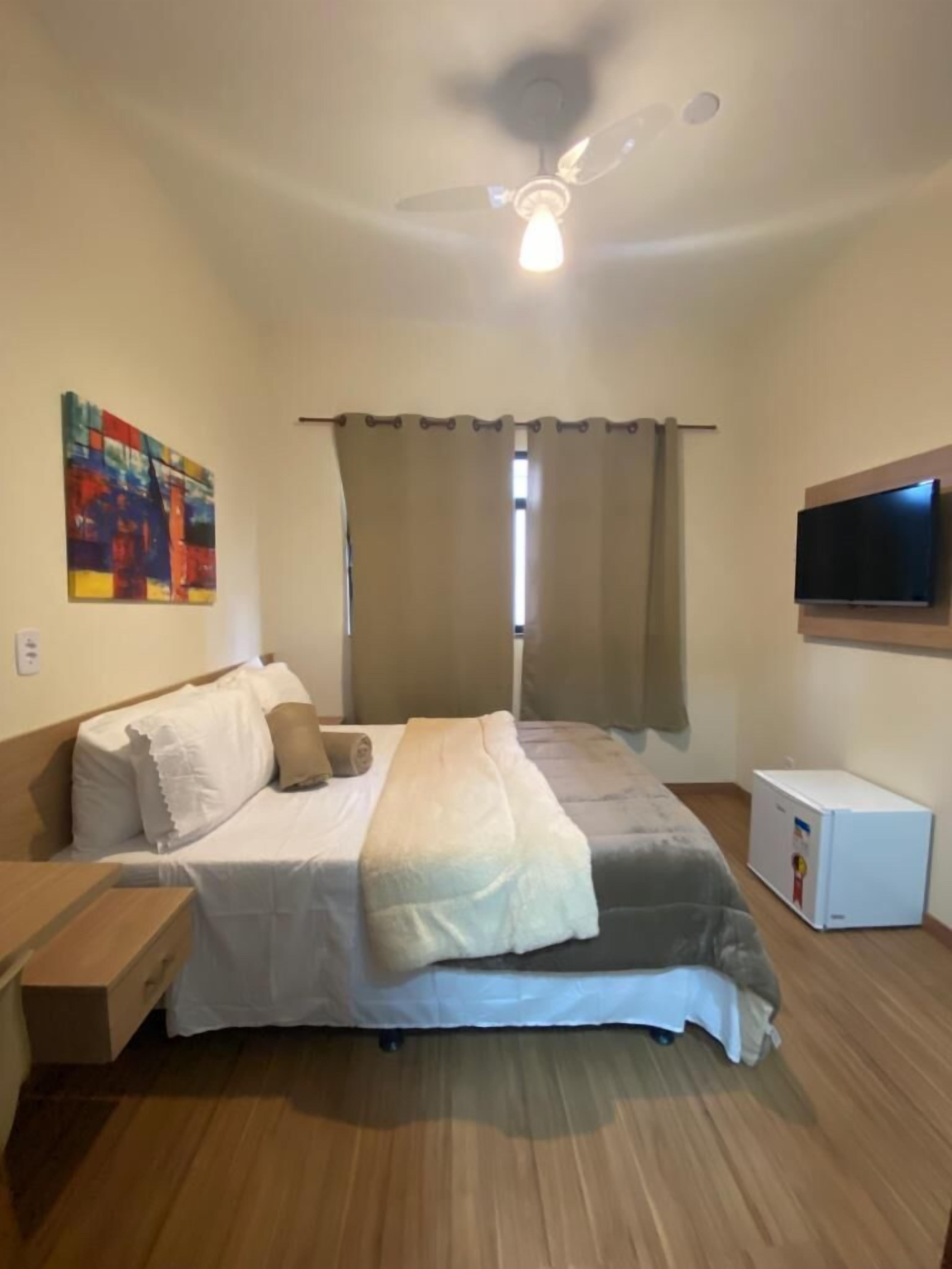 Suíte executiva | Roupas de cama antialérgicas, individualmente mobiliados, escrivaninha