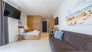 Premium Apartment, Sea View | In-room safe, individually decorated, individually furnished, desk