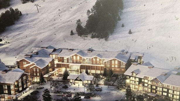 A ski resort with multiple buildings, ski lifts, and a snowy landscape. - Brand New 2-Story Loft Residence Above Cranmore Mountain Lodge (Conway)