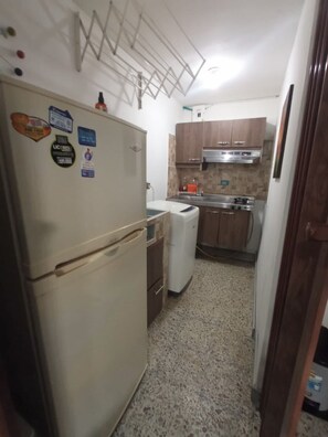 Private kitchen - Apartaestudio en Laureles la Castellana (Medellín)