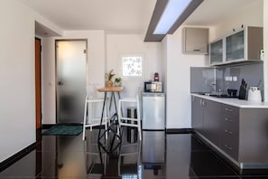 Apartment | Private kitchen | Fridge, microwave, stovetop, electric kettle