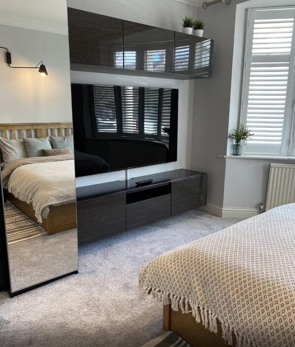 2 habitaciones, tabla de planchar con plancha y wifi gratis 