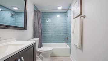 Hair dryer, towels, soap, shampoo