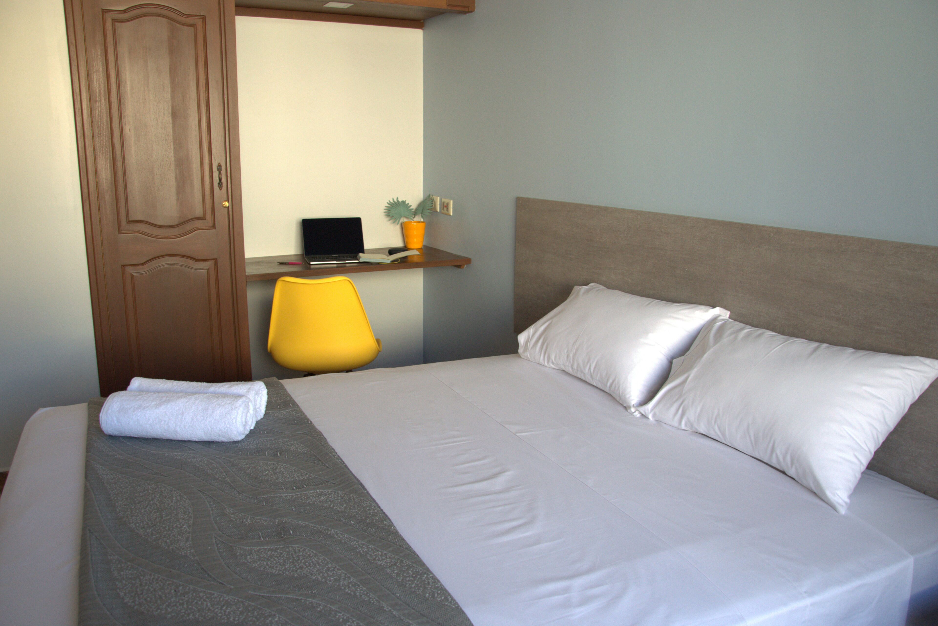 deluxe room, 1 queen bed | premium bedding, down duvets, memory-foam beds, free wifi