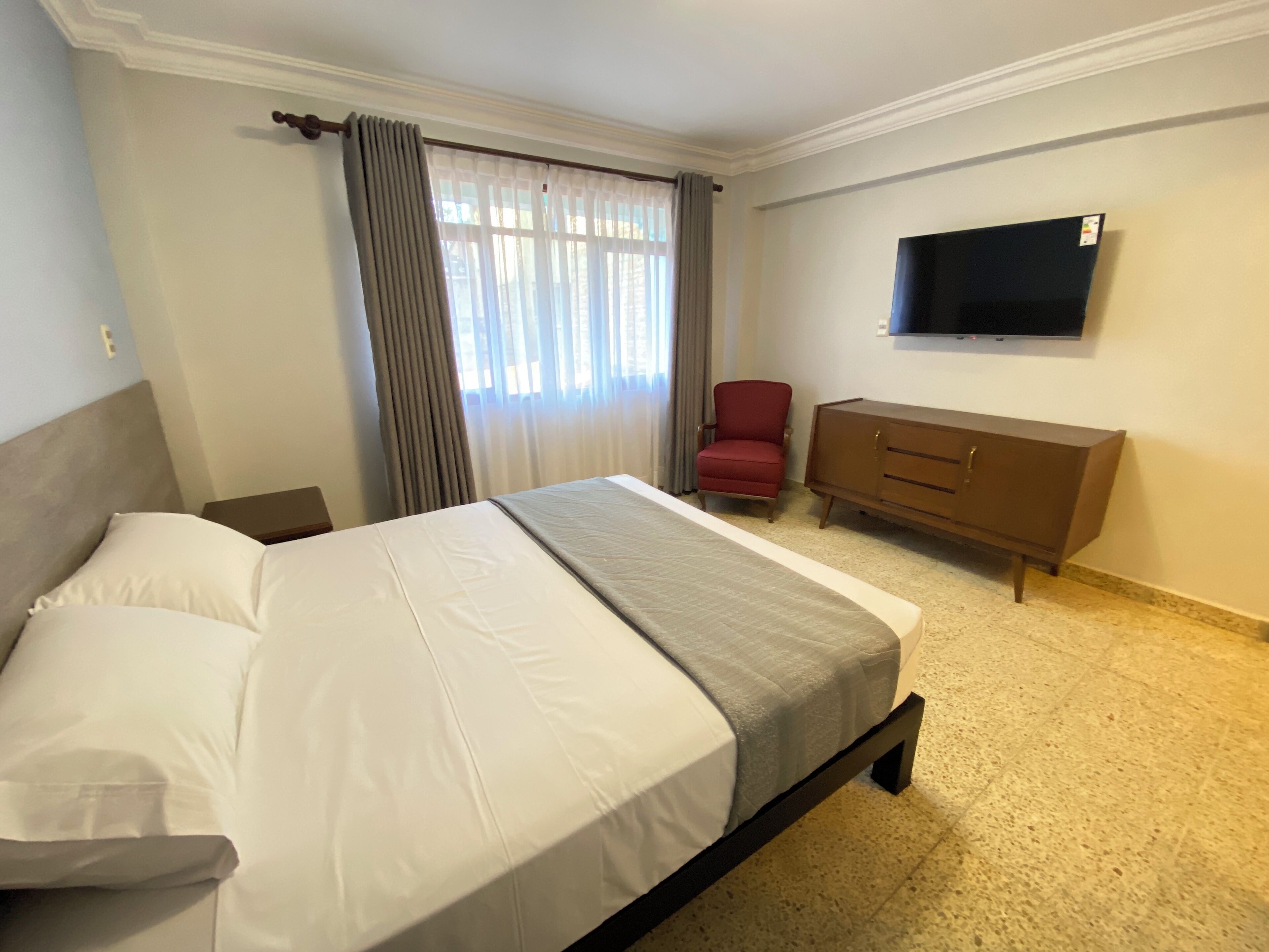 deluxe room, 1 queen bed | premium bedding, down duvets, memory-foam beds, free wifi