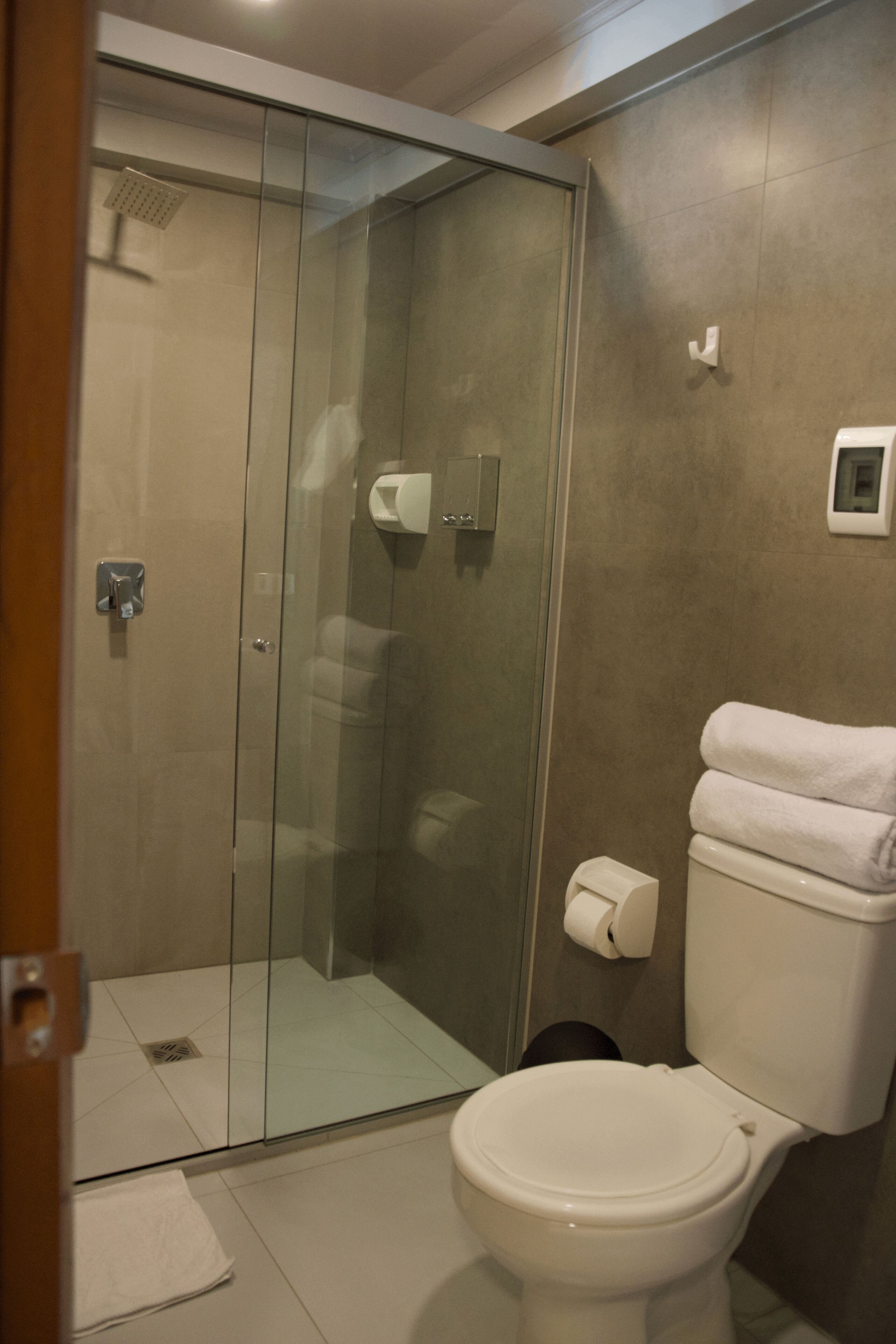 deluxe room, 1 queen bed | bathroom | shower, soap, shampoo, toilet paper
