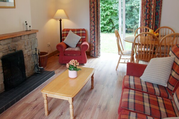 Cottage, Multiple Beds | Living area | Fireplace