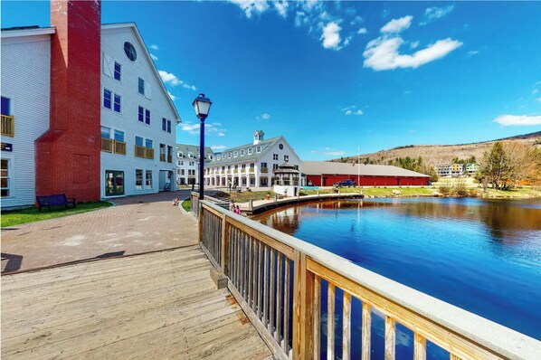 Stroll along the waterfront to a serene lake, taking in the picturesque views from the property's gazebo.