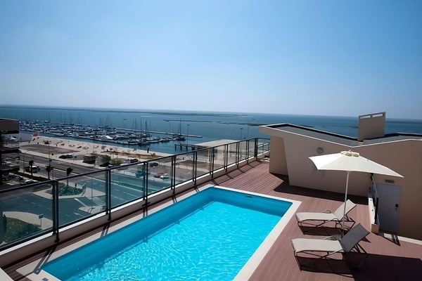 Dive into rooftop bliss with sweeping marina panoramas.
