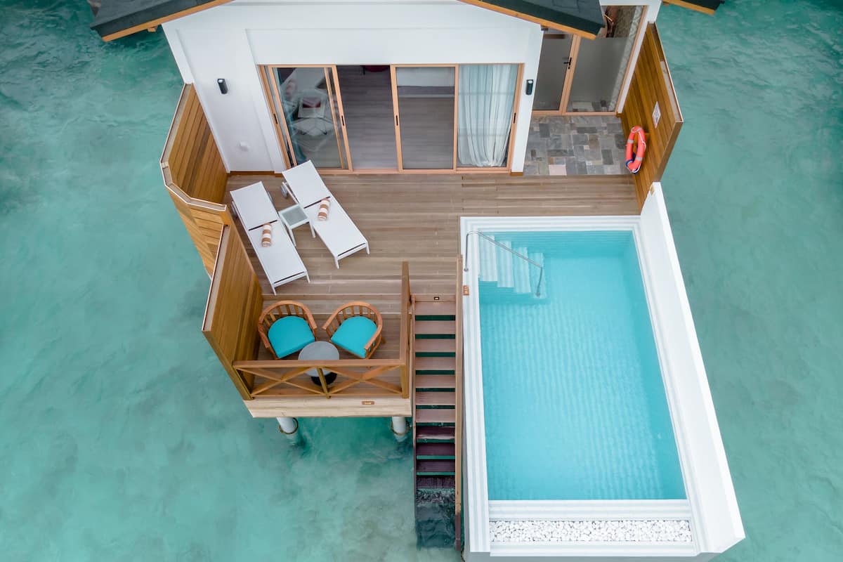 Lagoon Suite with Private Pool | 1 bedroom, free minibar items, in-room safe, individually decorated