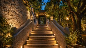 A staircase leading to a building entrance with a sign reading 'BANJARA HILLS'. - Banjara Hills Resort (Udaipur)