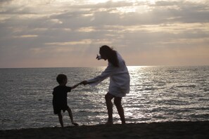 Private beach, black sand