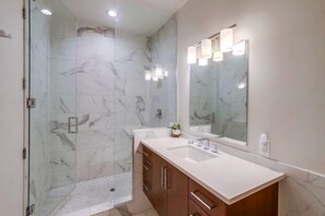 Bathtub, hair dryer, towels