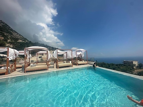 Seasonal outdoor pool. Amare Hotel
