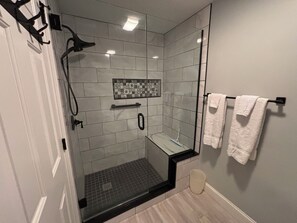 Bathtub, hair dryer, towels