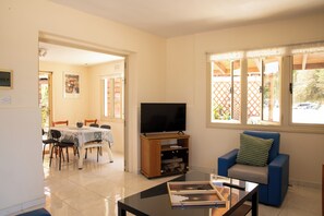 House | Living area | TV - Captivating Lake & Oceanview Getaway House (Meneou)