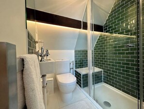 Ducha, toallas y jabón