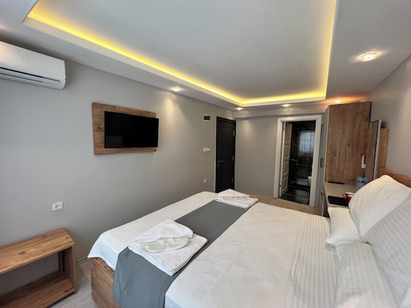 Chambre Double Économique | Rideaux occultants, fer et planche à repasser, Wi-Fi gratuit