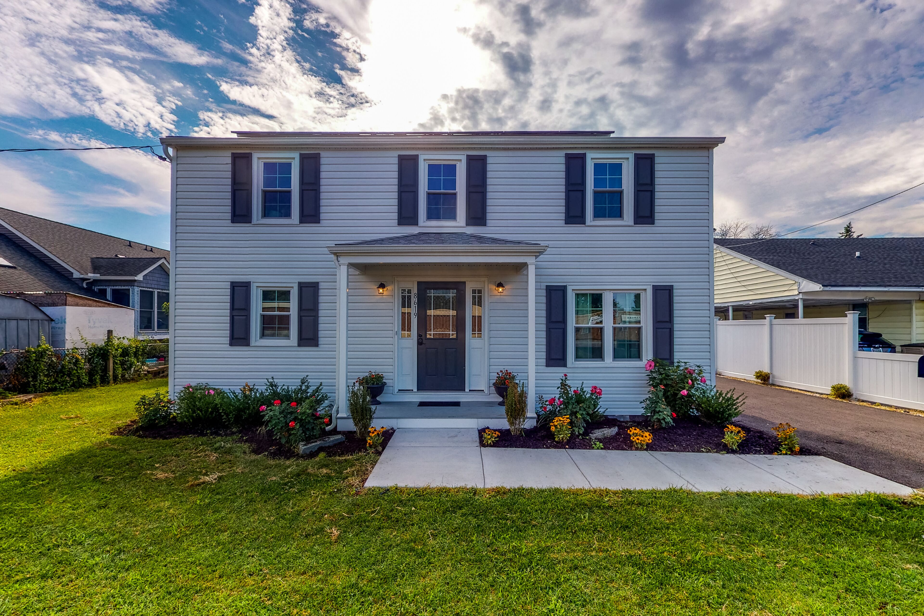 Lovely colonial-style home with pool access, firepit & large yard - dog-friendly
