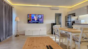 Appart'hôtel Deluxe, 1 très grand lit, vue océan | Draps en coton égyptien, literie de qualité supérieure