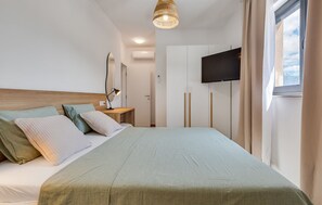 4 dormitorios, tabla de planchar con plancha, wifi gratis y ropa de cama