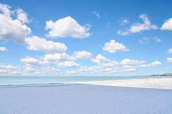 On the beach, sun-loungers, beach towels