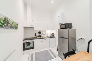Apartment | Private kitchen | Full-size fridge, microwave, oven, stovetop