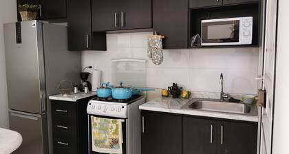 Casa de tres dormitorios, centrica, a 25 de la ciudad y lugares importantes.