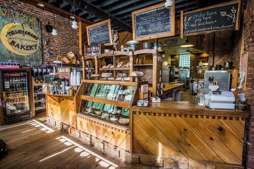 Bear cabin. This modern log cabin with HOT TUB is a large studio with a spectacular king size bed!