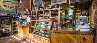 Bear cabin. This modern log cabin with HOT TUB is a large studio with a spectacular king size bed!