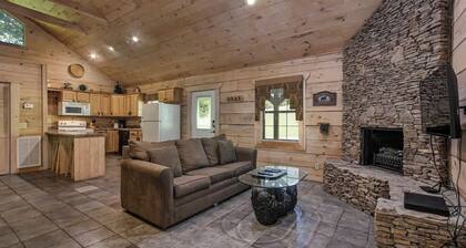 Bear cabin. This modern log cabin with HOT TUB is a large studio with a spectacular king size bed!