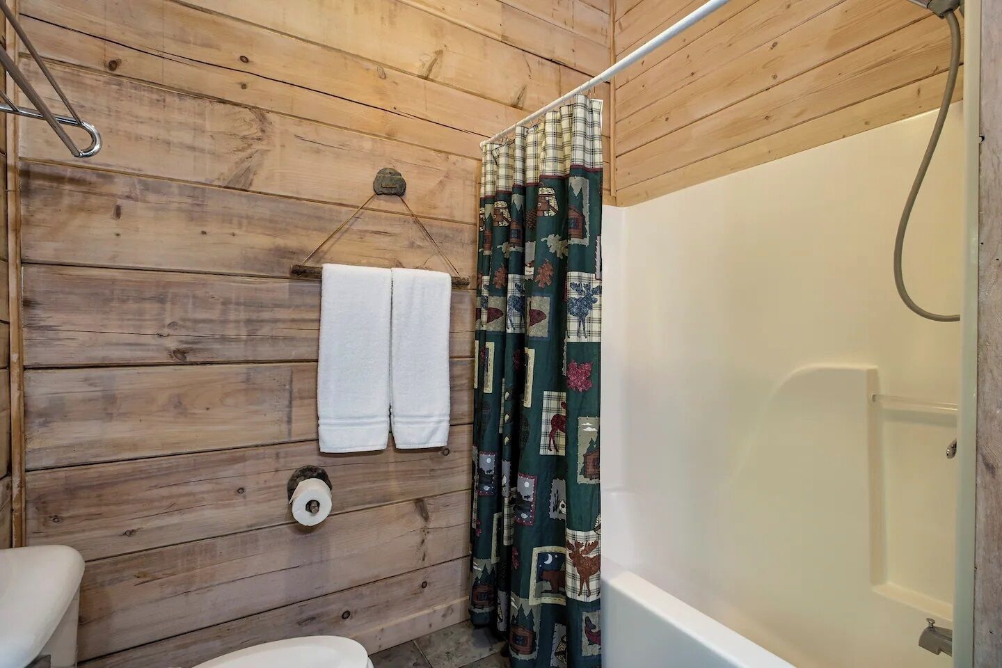Bathtub, hair dryer, towels