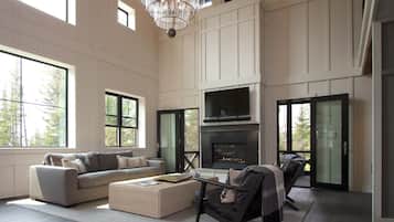 Smart TV, fireplace, books, stereo